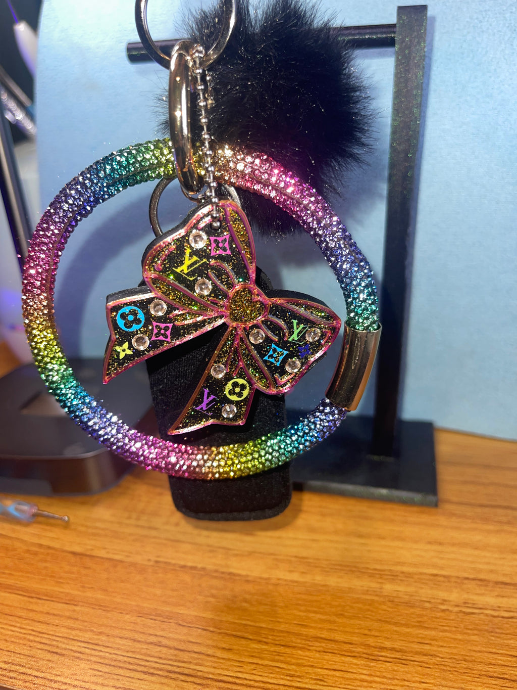 Decorated Bow Can opener/Nail saver plus set of mixed or matching wrist lanyard, puff ball, chapstick holder, key finder and tassel.