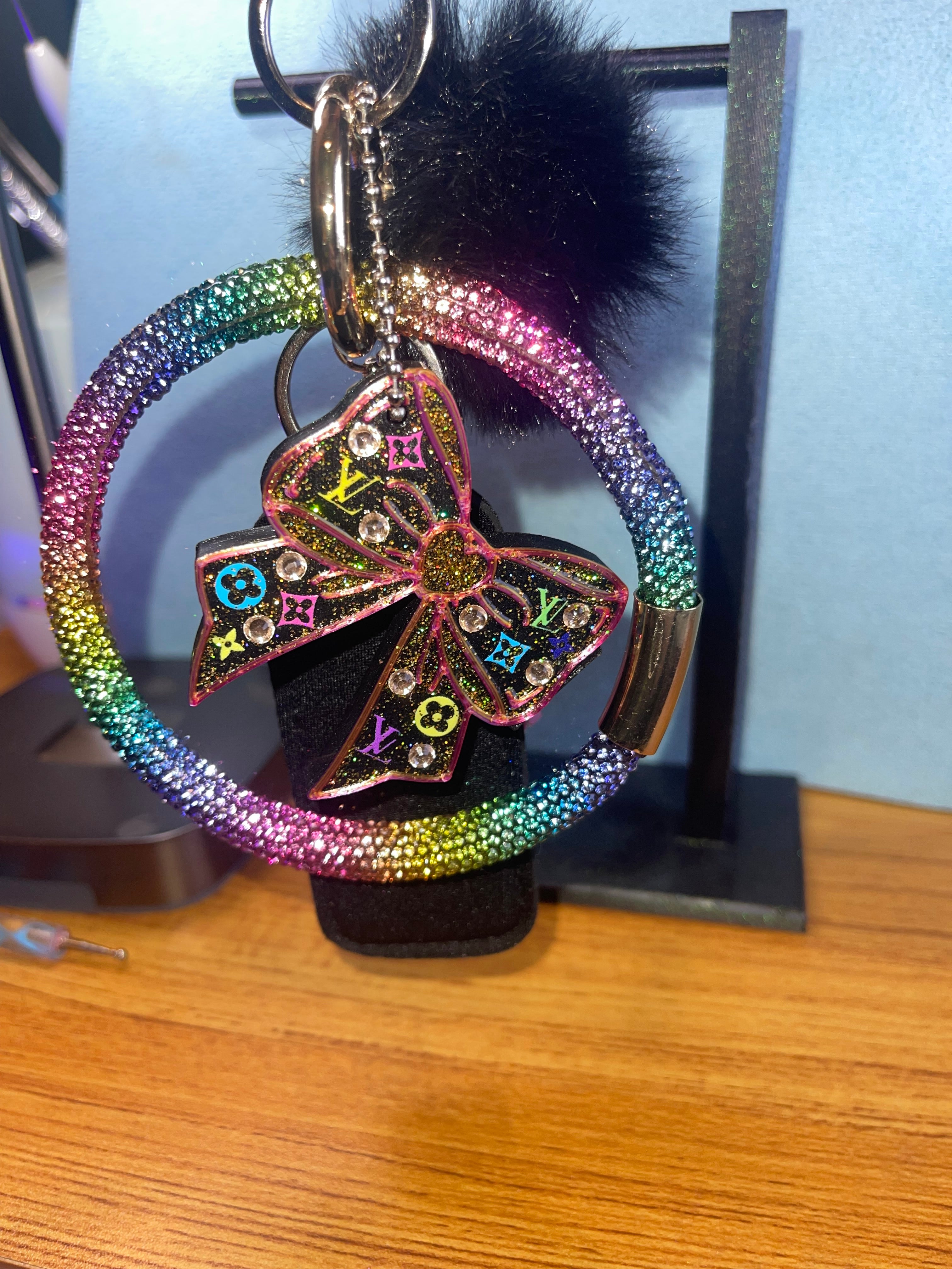 Decorated Bow Can opener/Nail saver plus set of mixed or matching wrist lanyard, puff ball, chapstick holder, key finder and tassel.