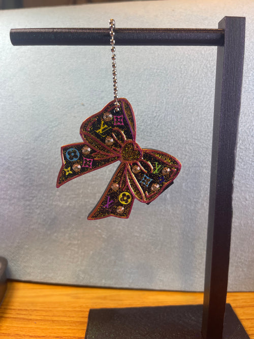 Decorated Bow Can opener/Nail saver